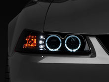 Load image into Gallery viewer, Raxiom 99-04 Ford Mustang Dual LED Halo Projector Headlights- Black Housing (Smoked Lens)